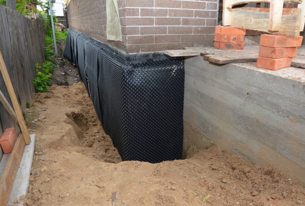 Happy homeowners after waterproofing job in Middleton